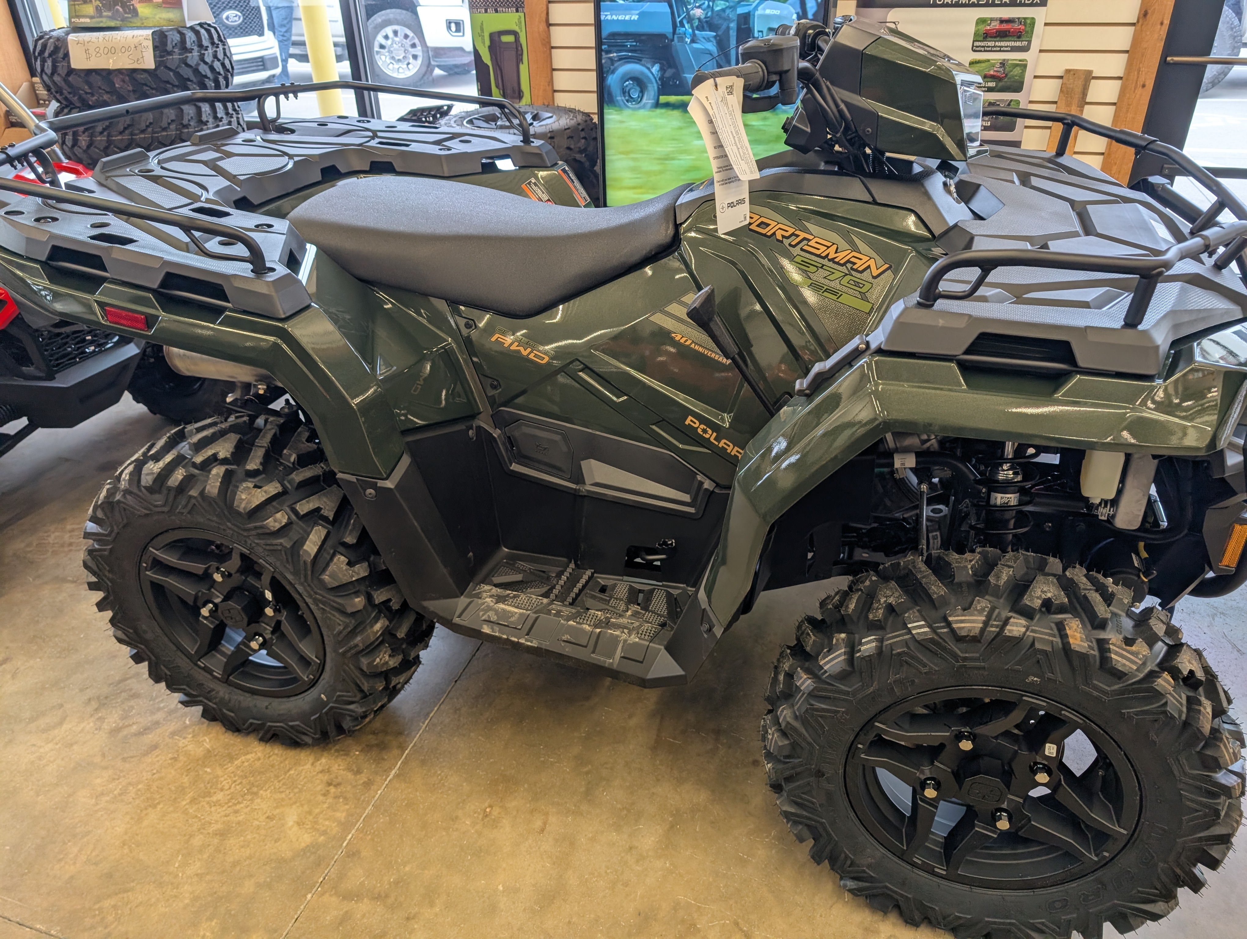 2026 Polaris Sportsman 570 Premium – 40th Anniversary Edition – 570 Series | 567cc ProStar® Engine | Treeline Green Metallic
